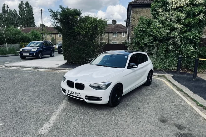 BMW 1 Series Sports In white colour standing on the ground