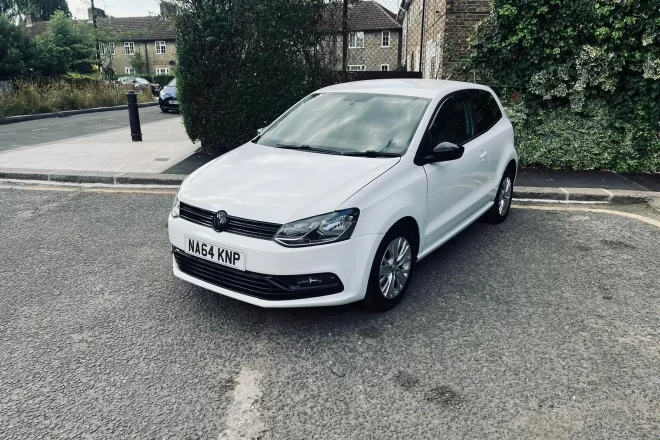 Volkswagen Polo SE TS in white colour standing on the ground