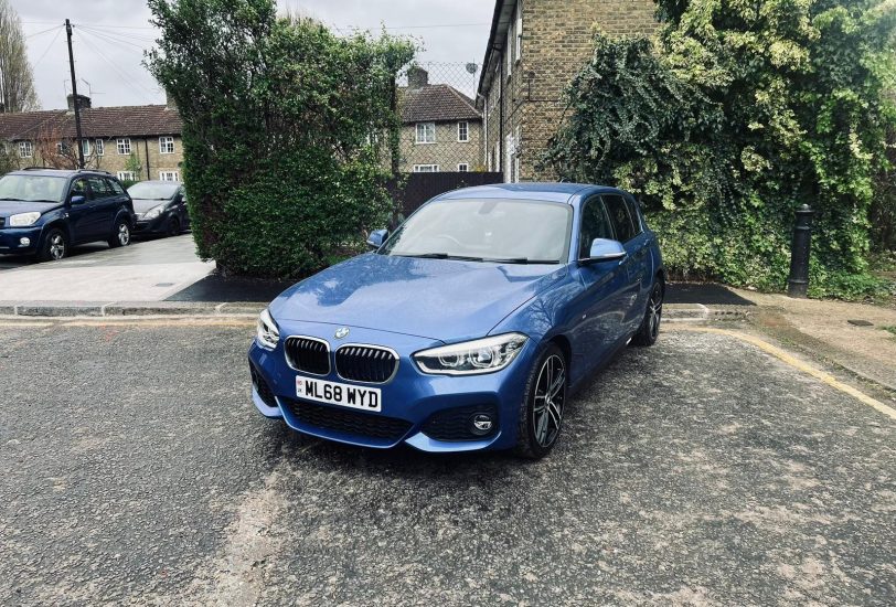 BMW 118D M Sports in Blue colour standing on the ground