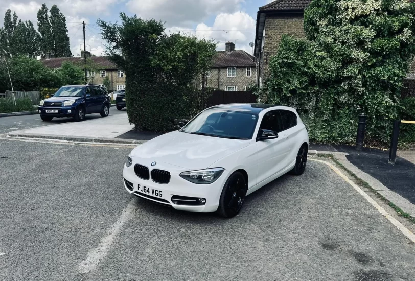 BMW 1 Series Sports In white colour standing on the ground